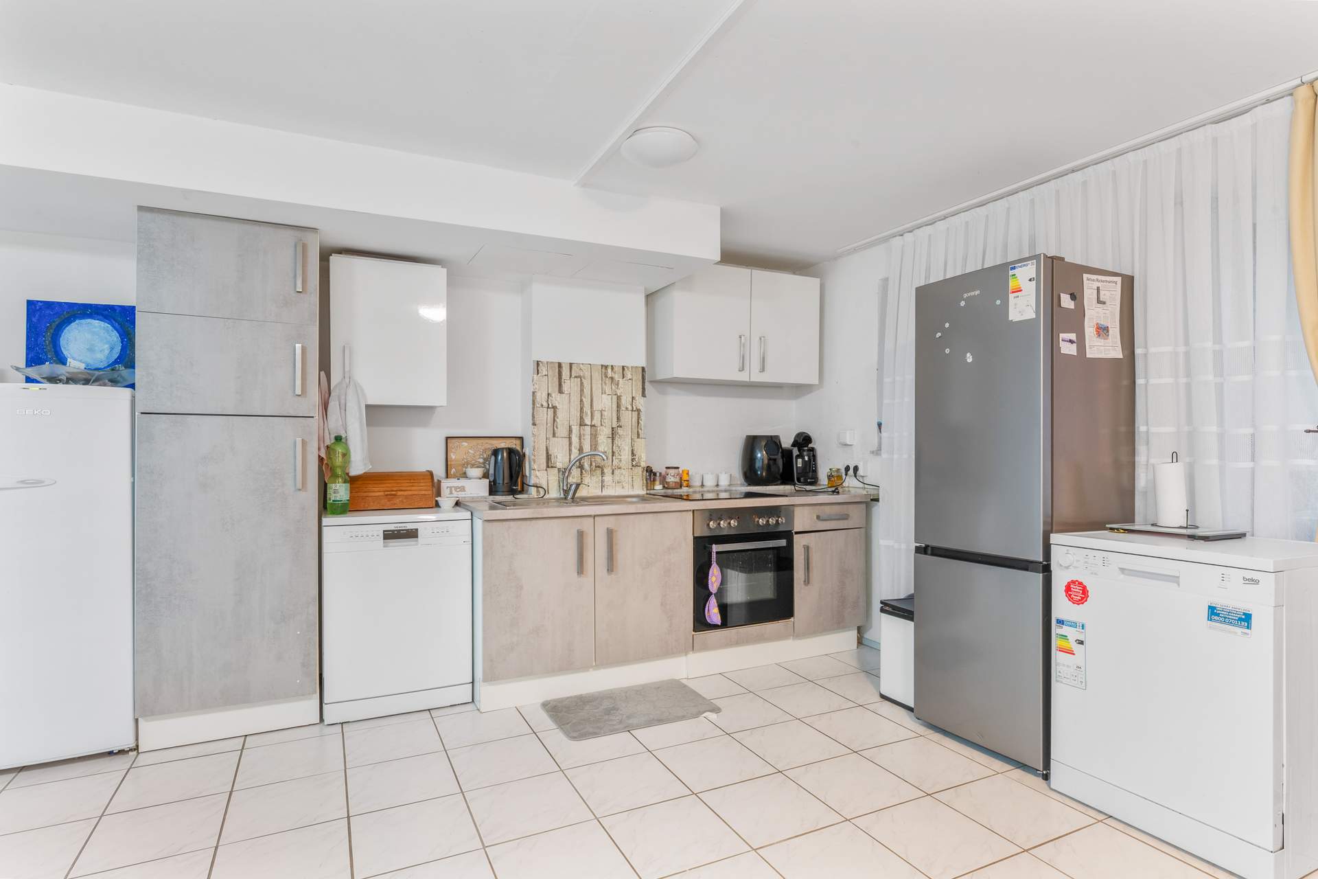 Großzügige Wohnung mit Garten & Doppelgarage – inklusive zwei Apartments! - Bild 18