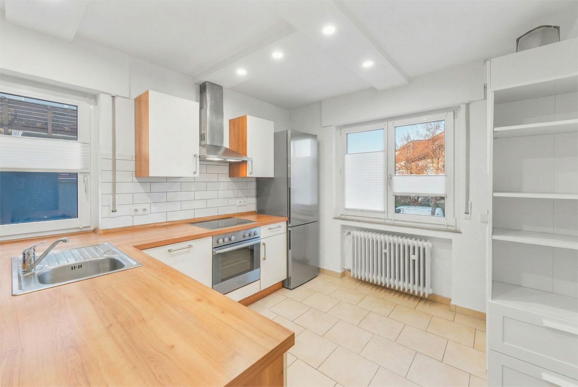 Attraktive Wohnung mit eigenem Garten, Balkon und Doppelgarage und viel Platz! - Bild 4